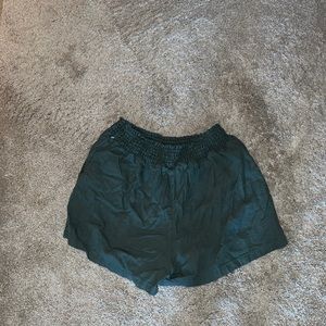I’m selling baggy forest green shorts